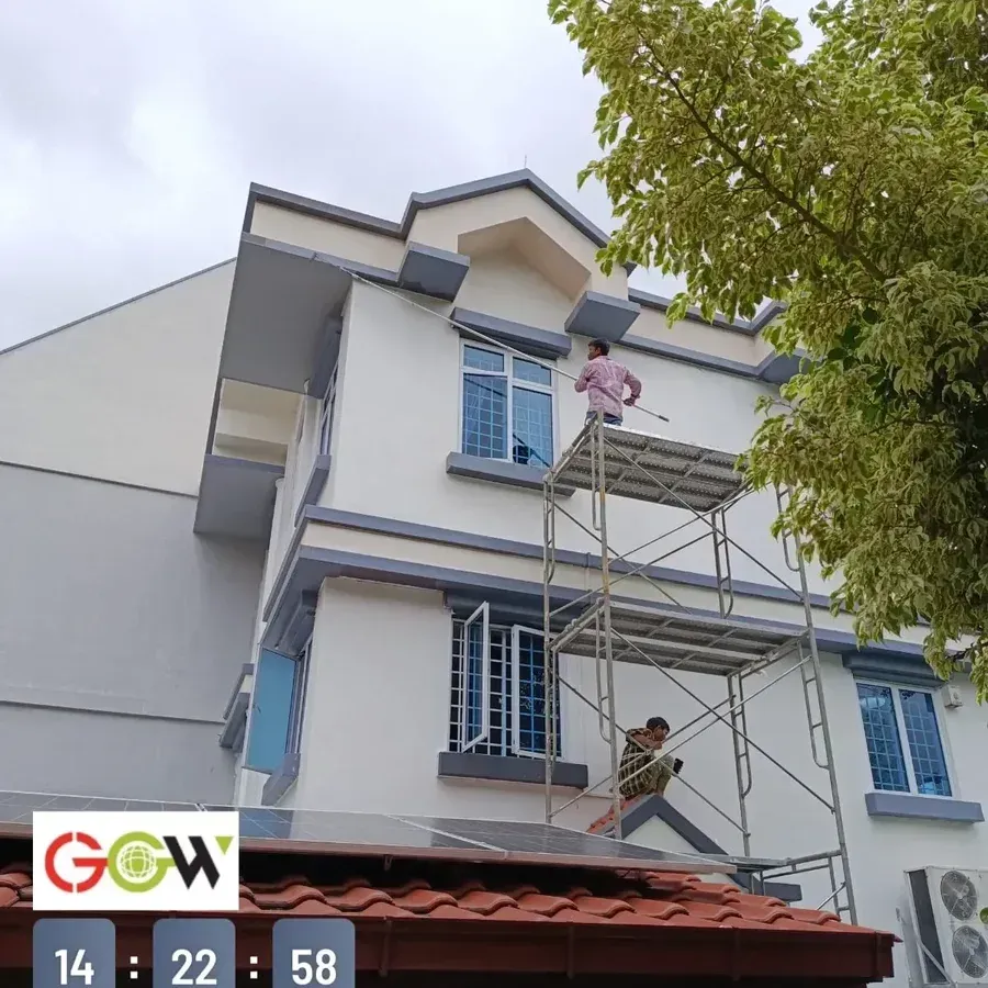 Two-tier scaffold in use for a full-height facade repaint